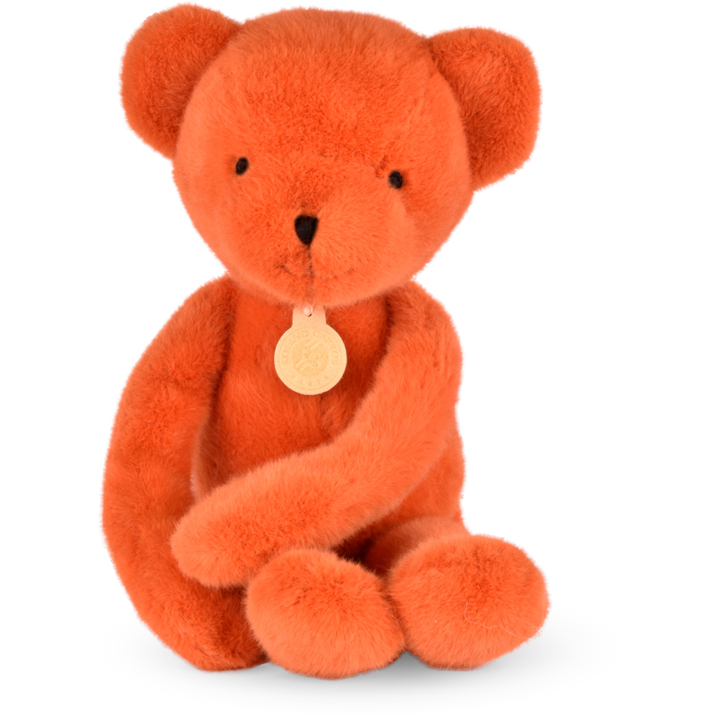 Peluche ours terre battue